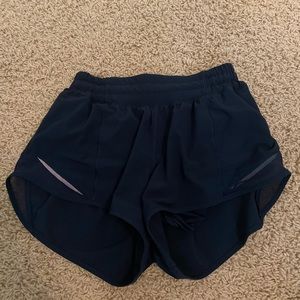 Navy blue Lululemon 2.5” hotty hot size 2